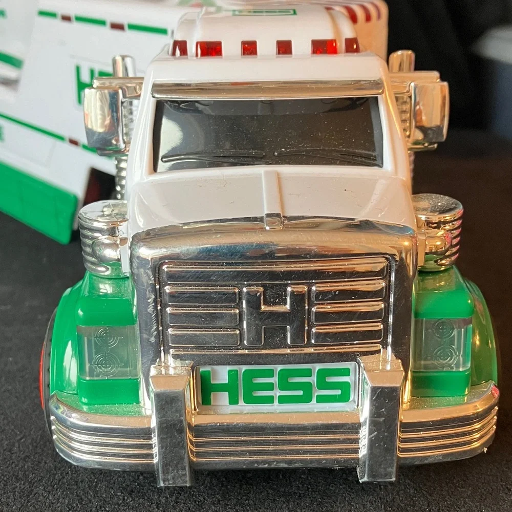 HESS Gasoline Semi Truck carrying helicopter Toy 2010 Toy plays sounds